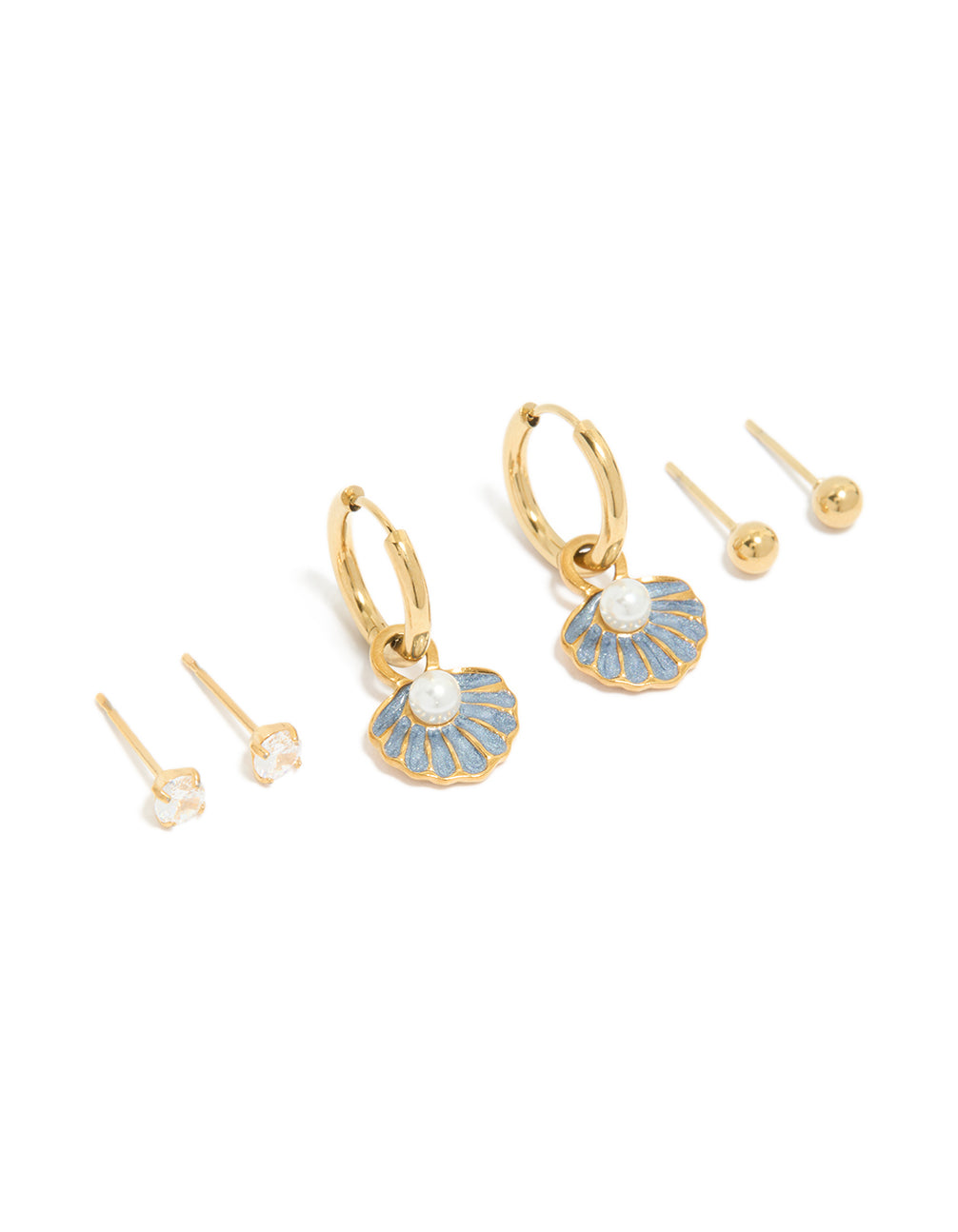 Ocean-inspired 3-pack earrings featuring shell charm hoops, clear stone studs, and ball studs in waterproof gold-plated stainless steel with white and light blue enamel accents front view