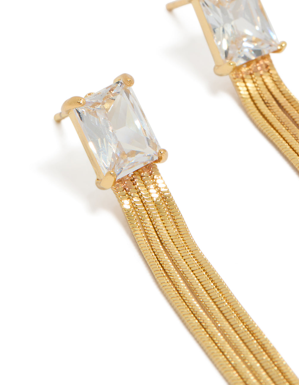 Designed with gold plated cubic zirconia square fringe drop earrings featuring tassel detailing and statement style close up view