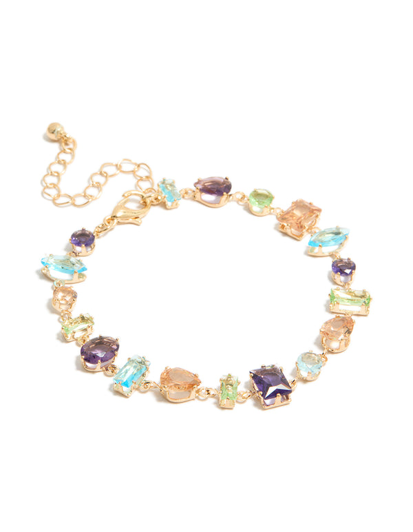 Displaying a bracelet with irregular shaped multicoloured diamantes in stackable gold front view