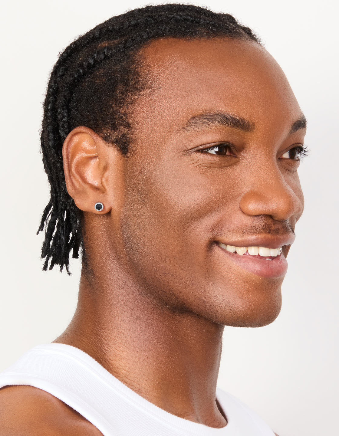 Presenting waterproof black coated stainless steel round flat back studs in silver on model view
