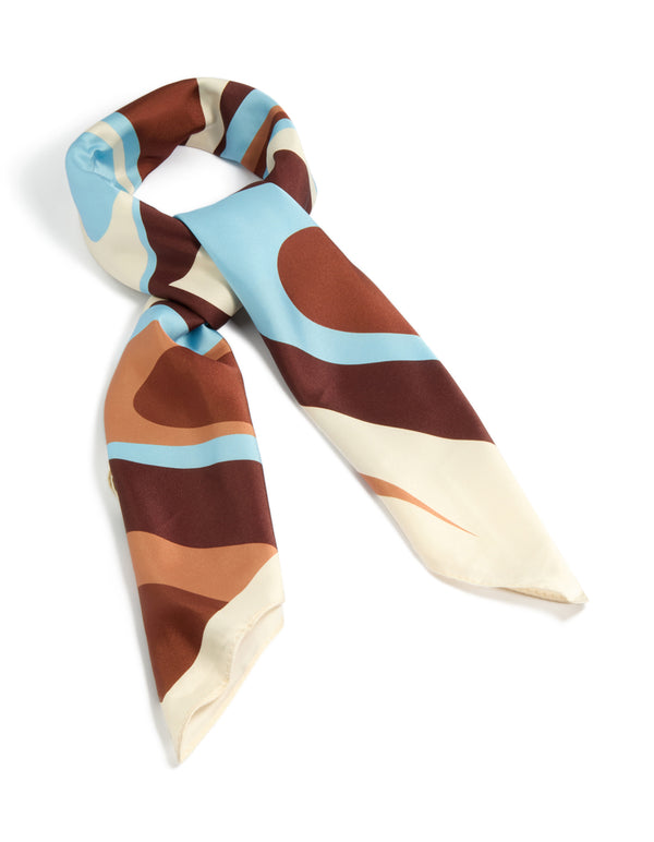 Showcasing a pale blue chocolate brown surreal swirl scarf with abstract print in ivory and peru tones front view