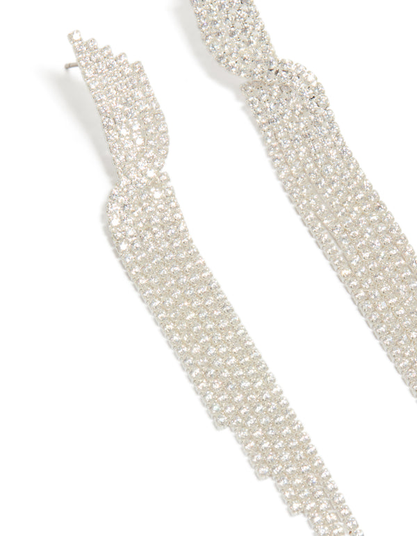 Highlighting silver cubic zirconia cupchain drop earrings with detailed cupchain texture, tassel design close up view