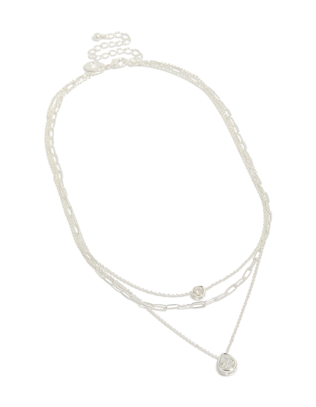 Showcasing a silver plated cubic zirconia bezel chain layered necklace front view