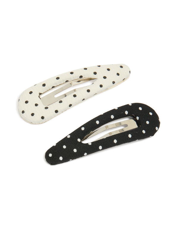 Polka dot snap clips in a 2-pack with black and white colors front view