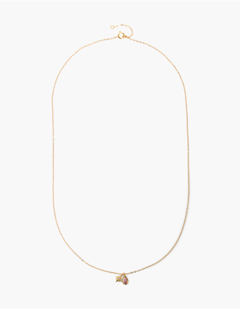 Elegant gold plated sterling silver pink cubic zirconia October birthstone necklace with celestial star charm and pendant on neck view