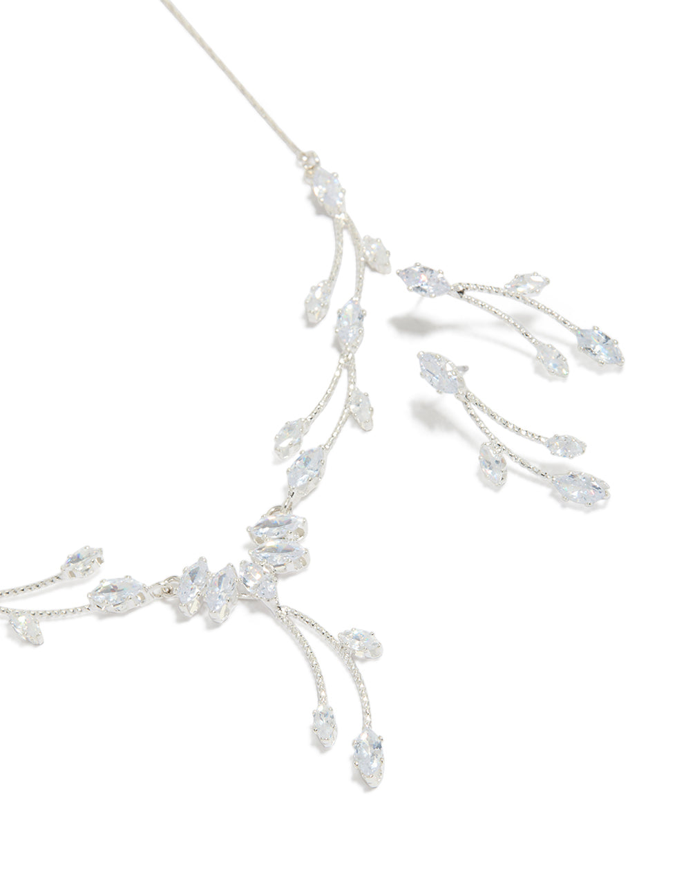 This elegant silver floral leaf vine Y-necklace and earrings set features intricate botanical details close up view