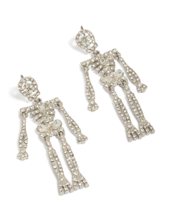 Displaying statement drop earrings with glam skeleton design in diamante embellished silver front view