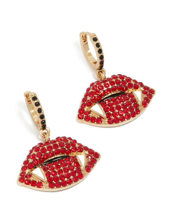 Showcasing gold vampire kiss earrings featuring charm design with red and black embellishments front view
