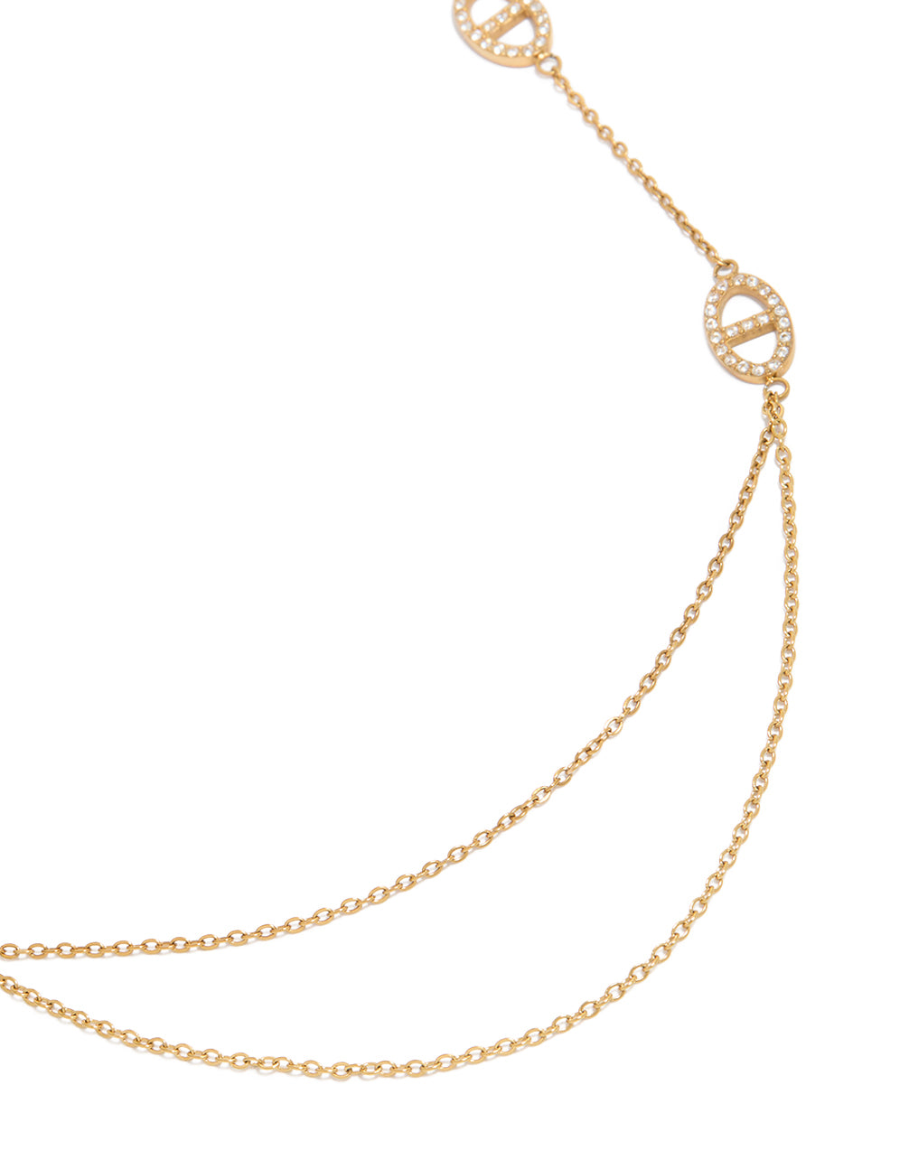 Showcasing a waterproof double chain necklace with charm featuring oval cut cubic zirconia in gold plated stainless steel close up view