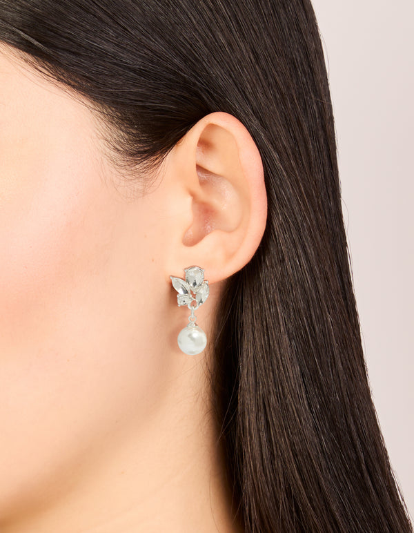 Elegant crystal marquise pearl stud drop earrings featuring white and silver design on ear view