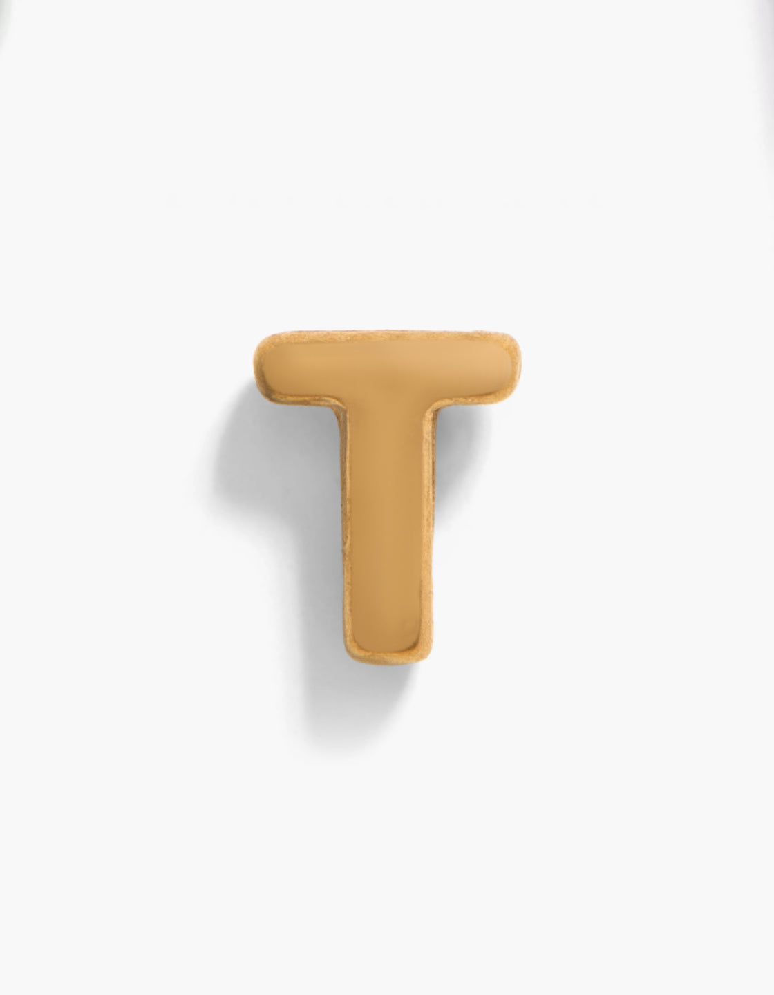 Showcasing a gold plated titanium letter T single threadless flat back stud with initials in gold front view