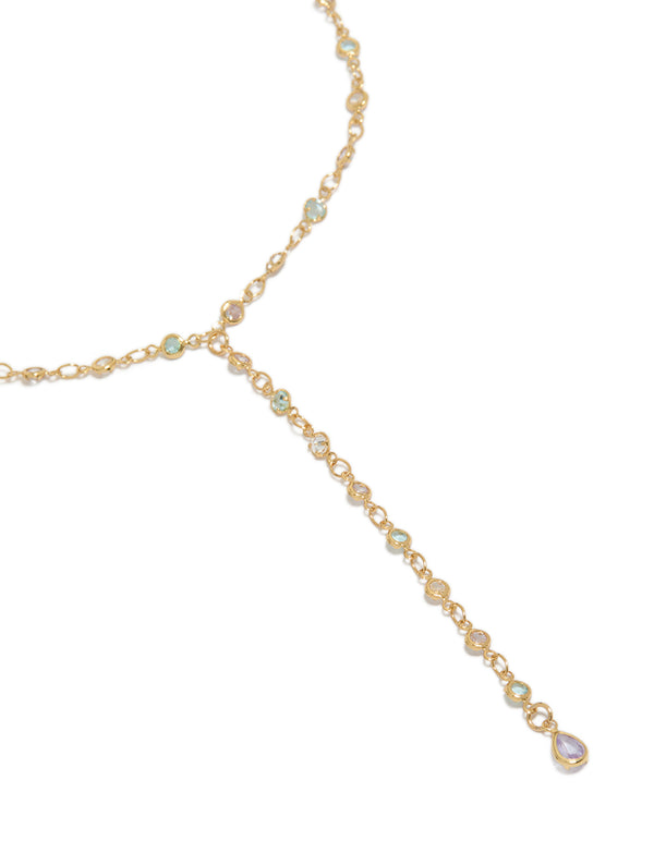 Showcasing a gold plated cubic zirconia blue circle detail Y-necklace with dainty style close up view