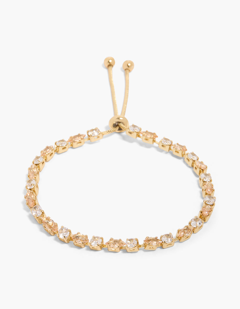Showcasing a gold plated cubic zirconia round and oval tennis bracelet with adjustable front view