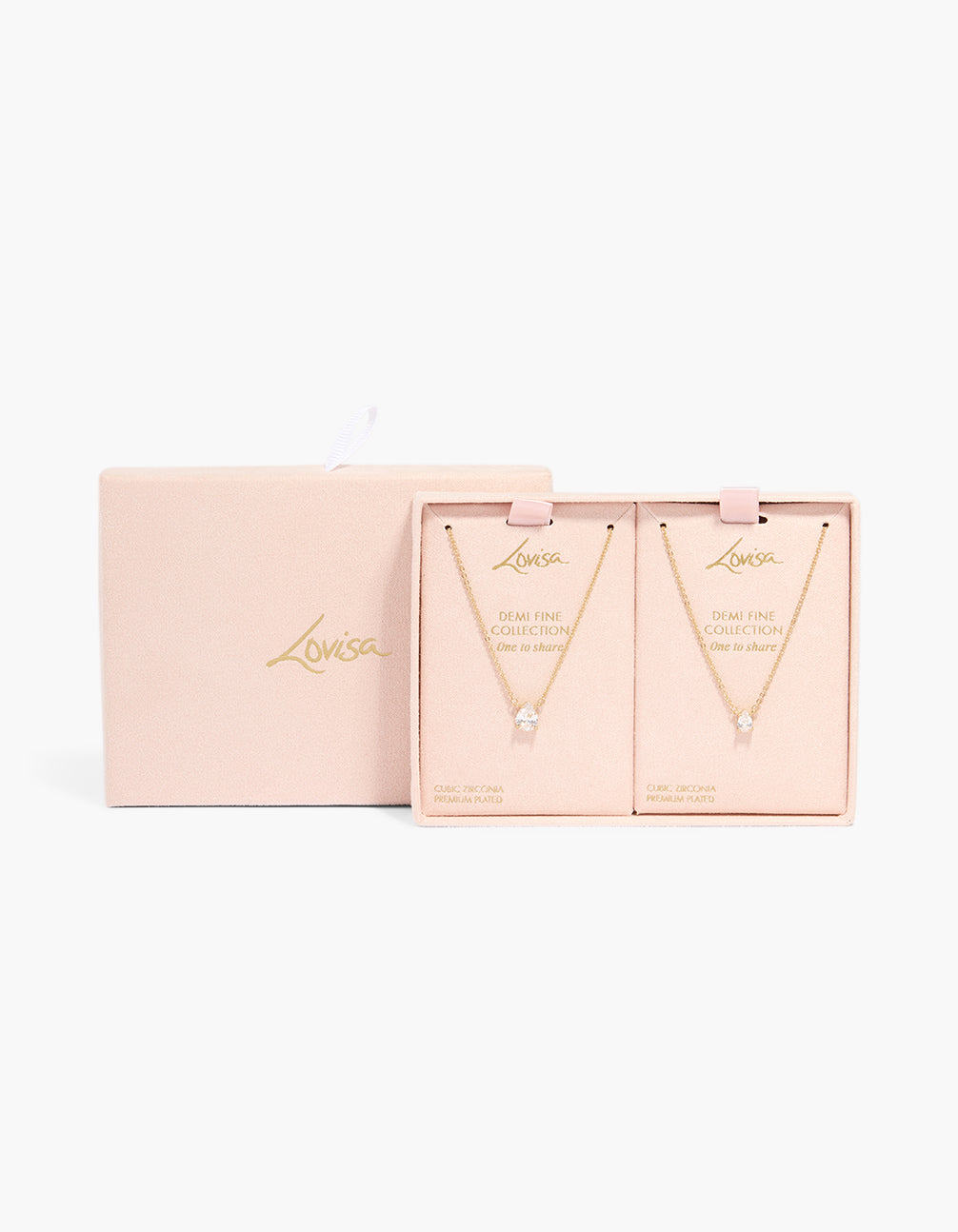 Crafted from gold plated material, these pear cubic zirconia pendant necklaces in a 2-pack with crystal elements are shown close up view