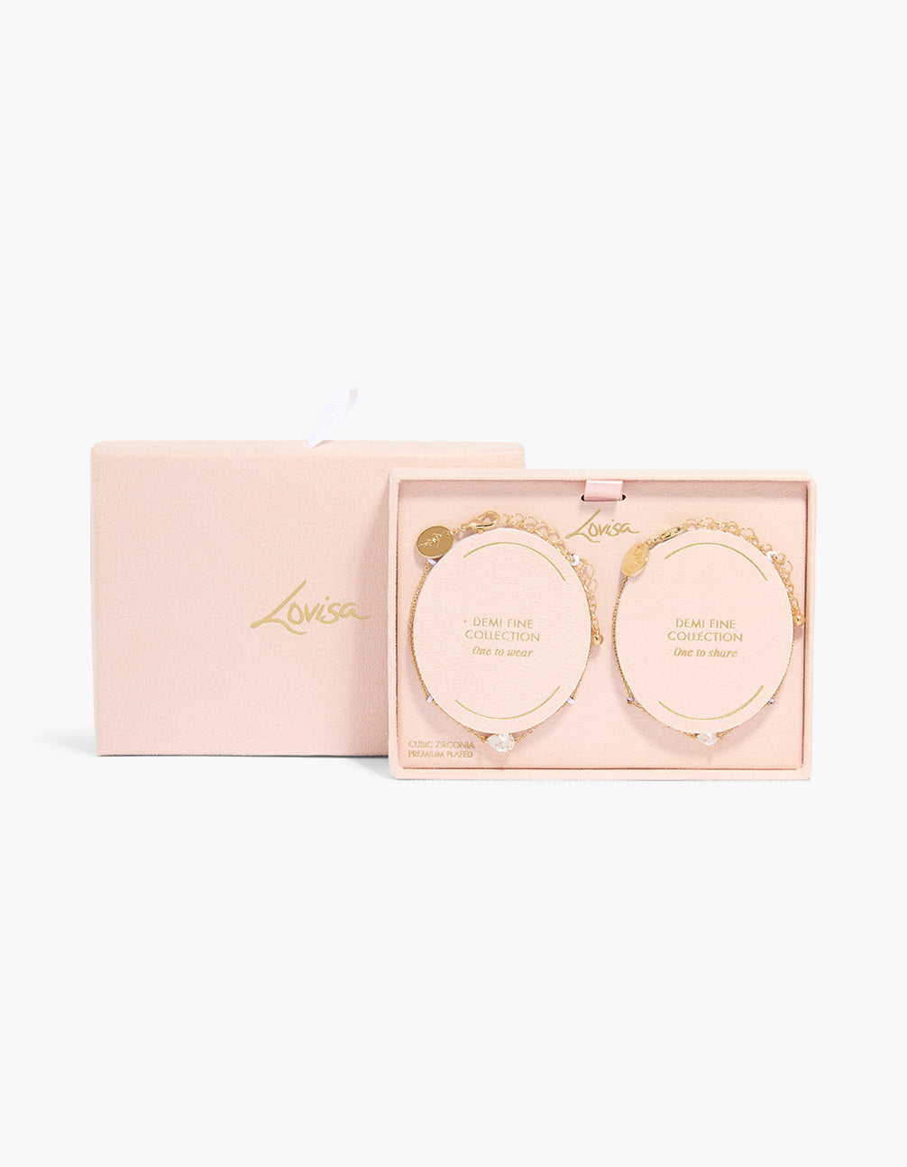 Elegant gold plated pear cubic zirconia pendant bracelets with 2-pack presented in packaging close up view