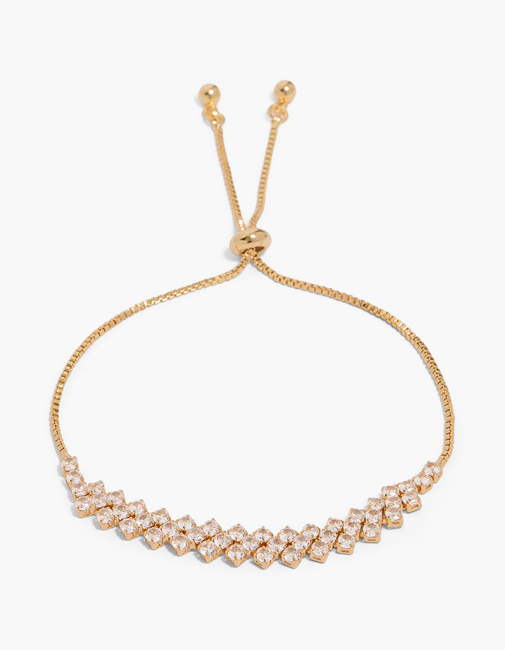 Explore this gold plated cubic zirconia layered toggle bracelet featuring statement details front view