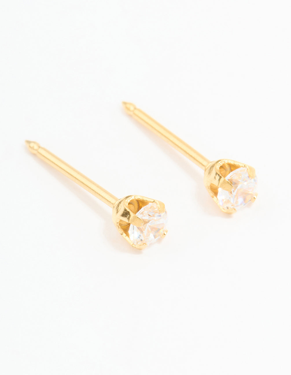 A pair of 24K gold plated surgical stainless steel 3MM cubic zirconia piercing studs crafted from clear gemstones with stud closure front view