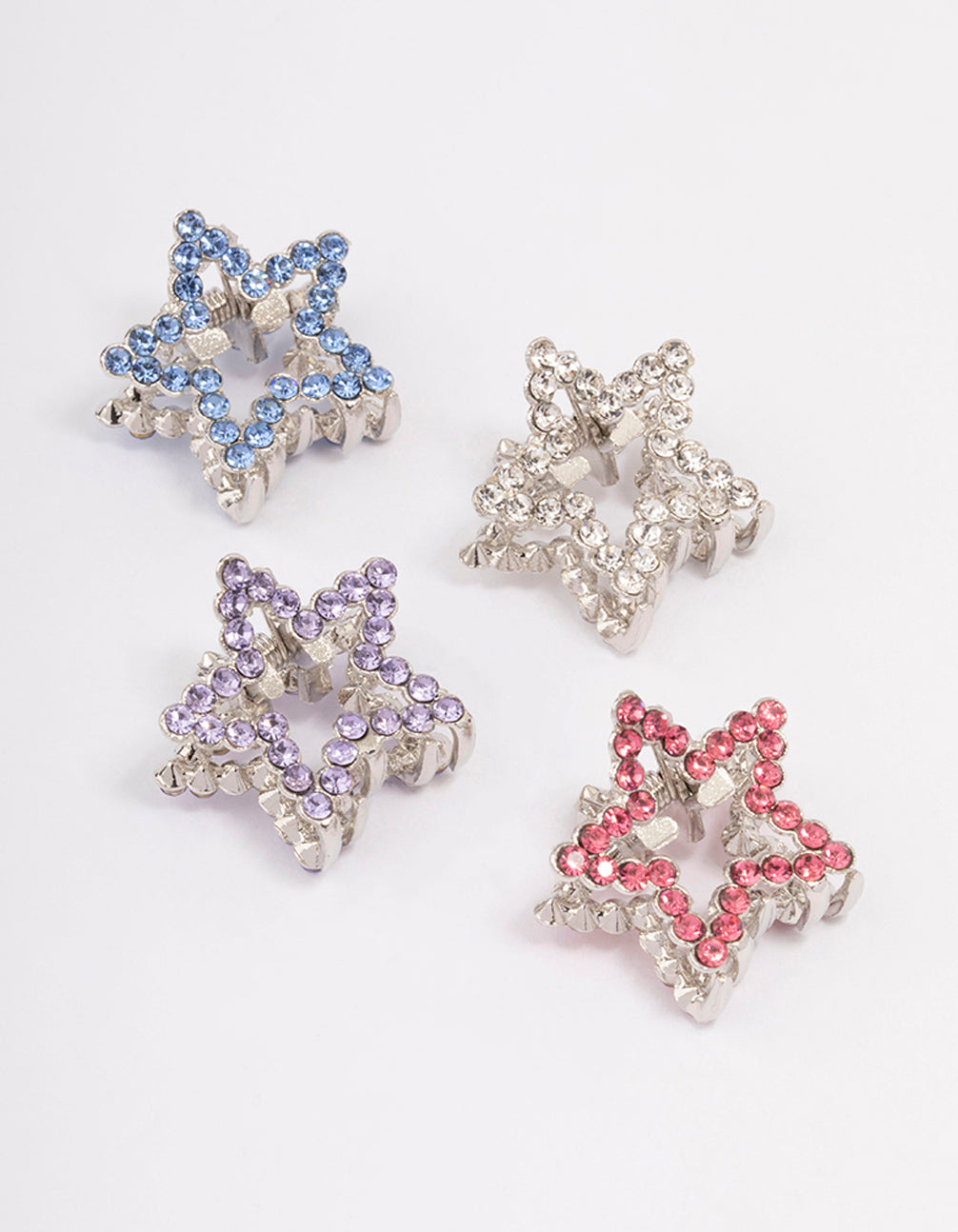 Discover the silver mini diamante star hair claw clip 4-pack featuring celestial design front view