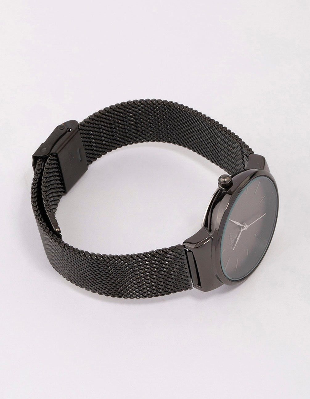 Elegant women's black analog timepiece with round dial and mesh strap in casual style front view