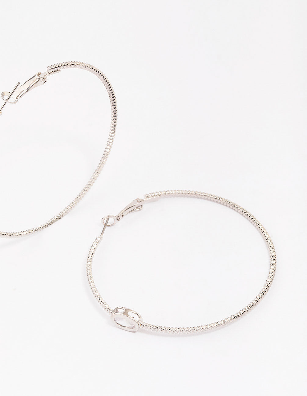 Silver Textural Oval Cubic Zirconia Hoop Earrings