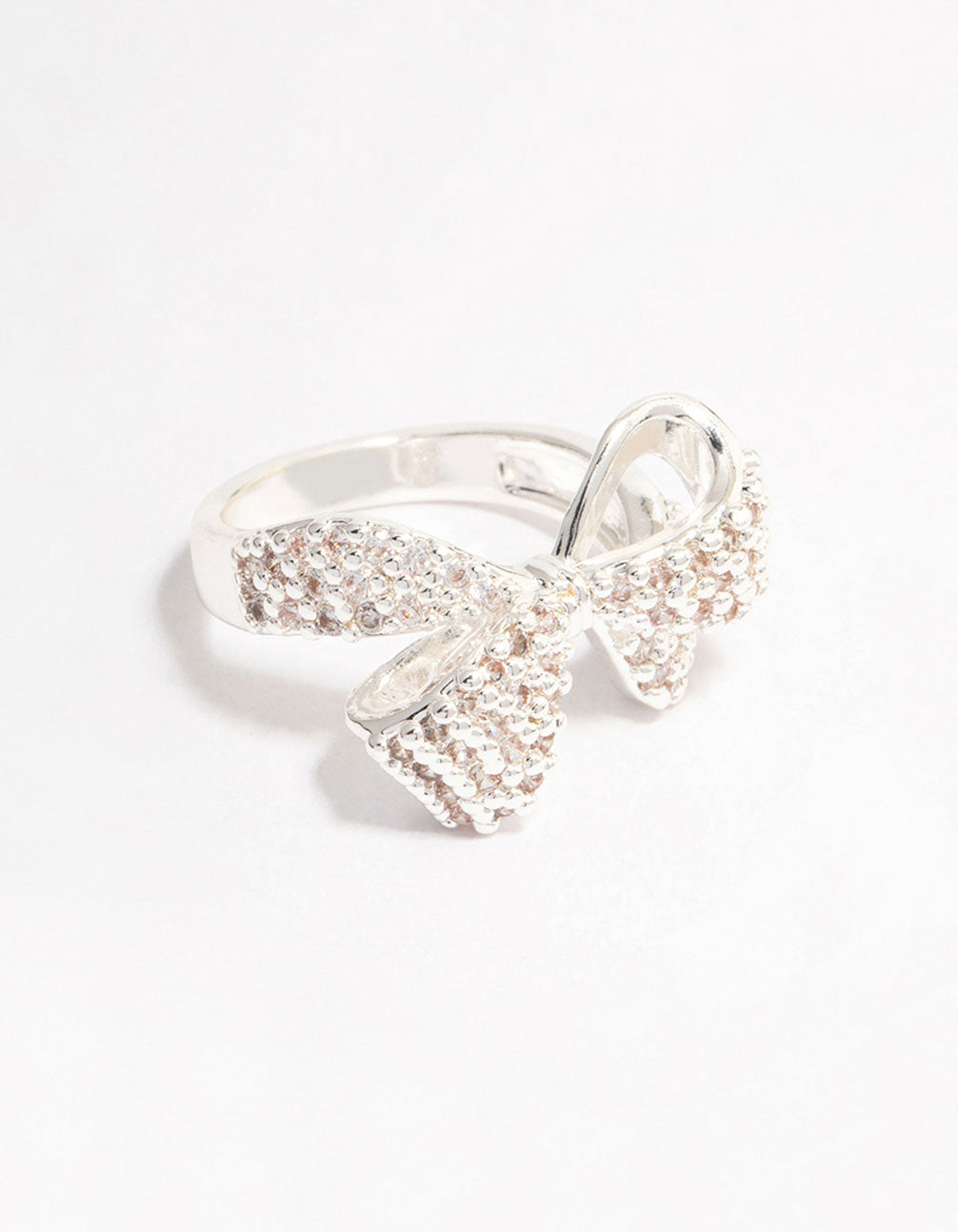 Showcasing a silver plated precious bow ring featuring cubic zirconia front view