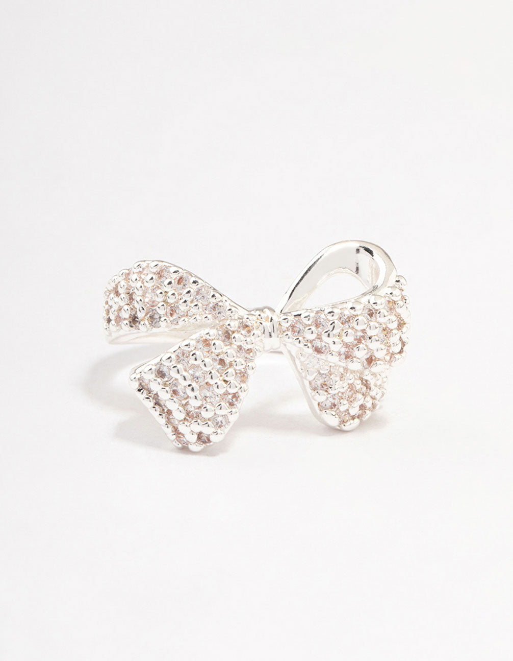 Designed with a bow and cubic zirconia accents, this silver plated precious ring close up view