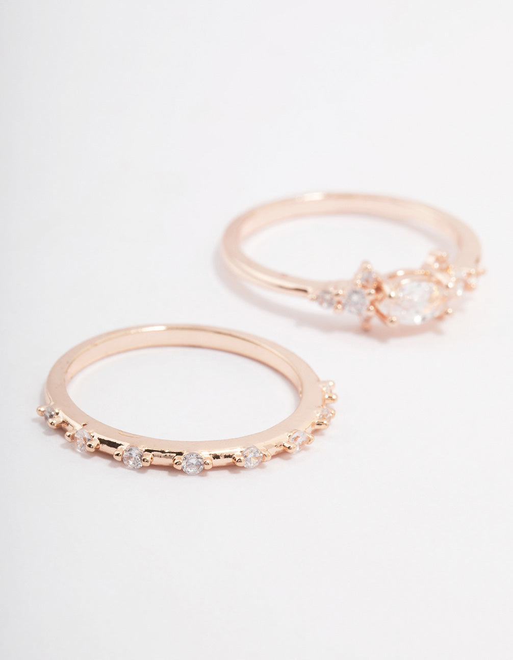 Elegant rose gold marquise stacking ring in a 3-pack close up view