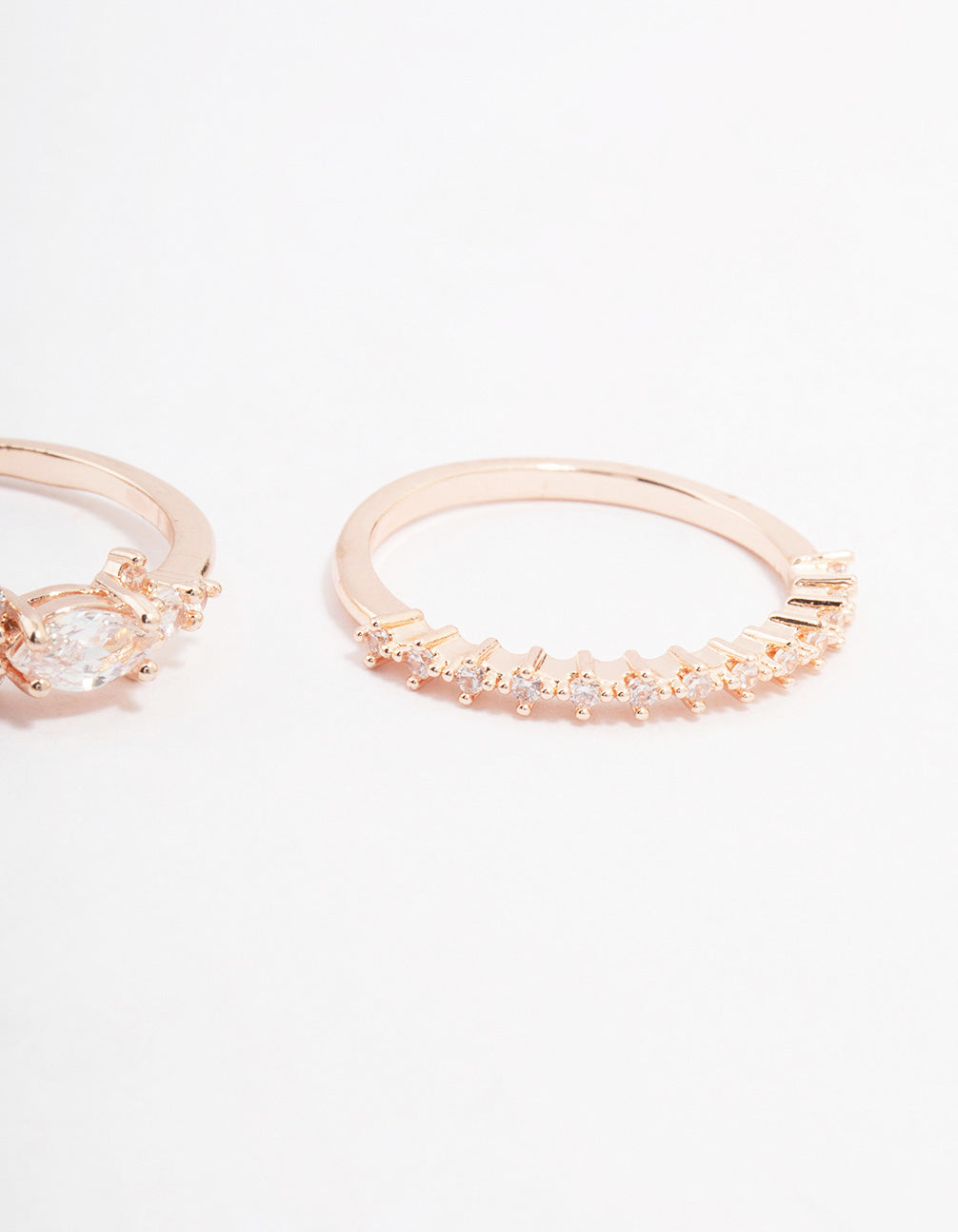 Elegant rose gold marquise stacking ring in a 3-pack close up view