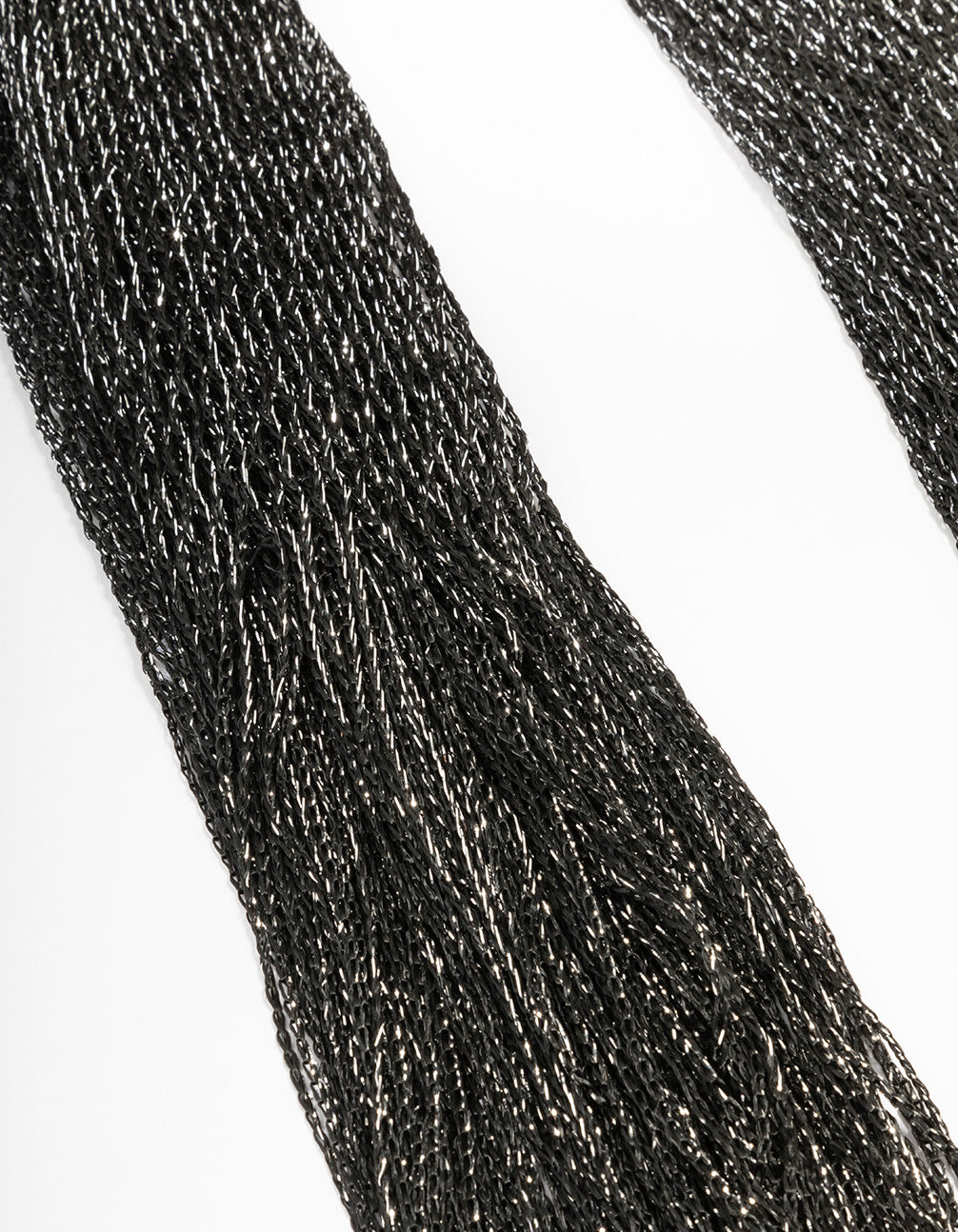 Elegant black fabric drape scarf necklace showcasing tassel texture in solid detail view