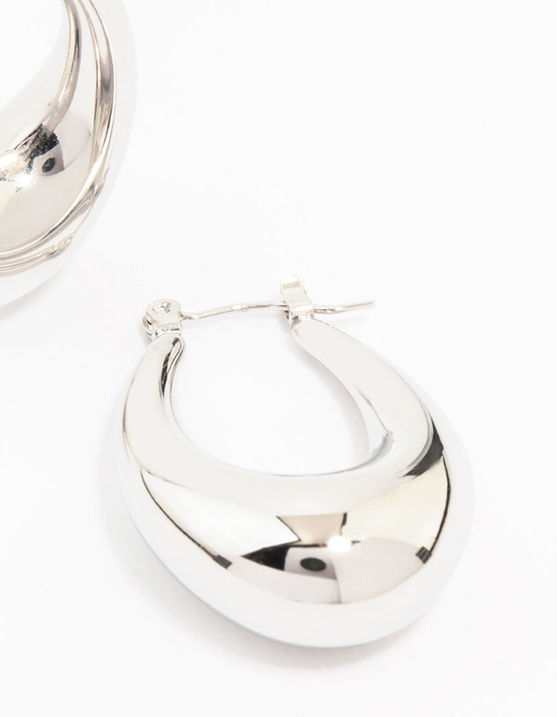 Designed with waterproof stainless steel full loop drop hoop closure in silver post detail view