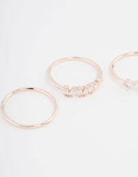 Showcasing rose gold plated cubic zirconia baguette ring 3-pack close up view - link has visual effect only