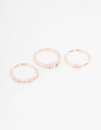 Showcasing a rose gold plated baguette and mini round cubic zirconia ring 3-pack front view - link has visual effect only