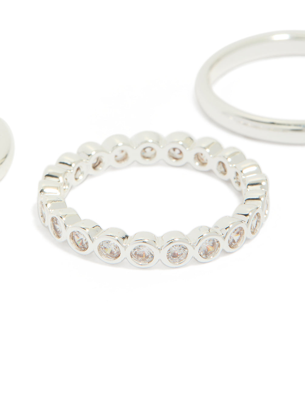 Designed with round cubic zirconia in silver plated fine stacking rings 3-pack close up view