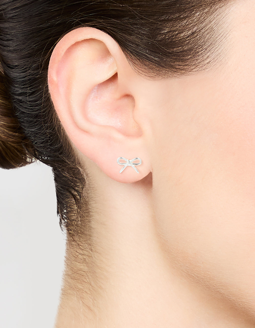 Sterling Silver Cut Out Bow Stud Earrings