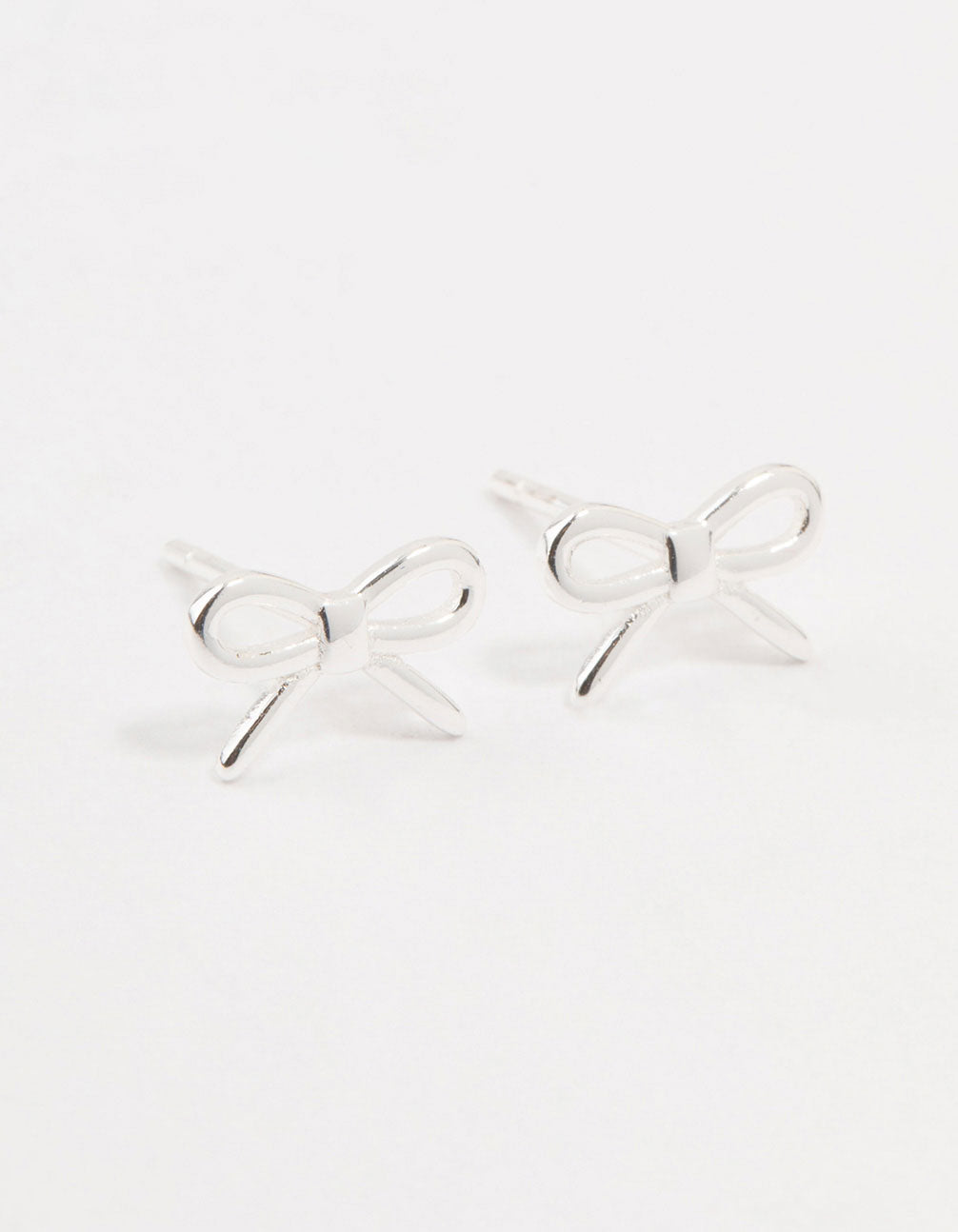 Sterling Silver Cut Out Bow Stud Earrings