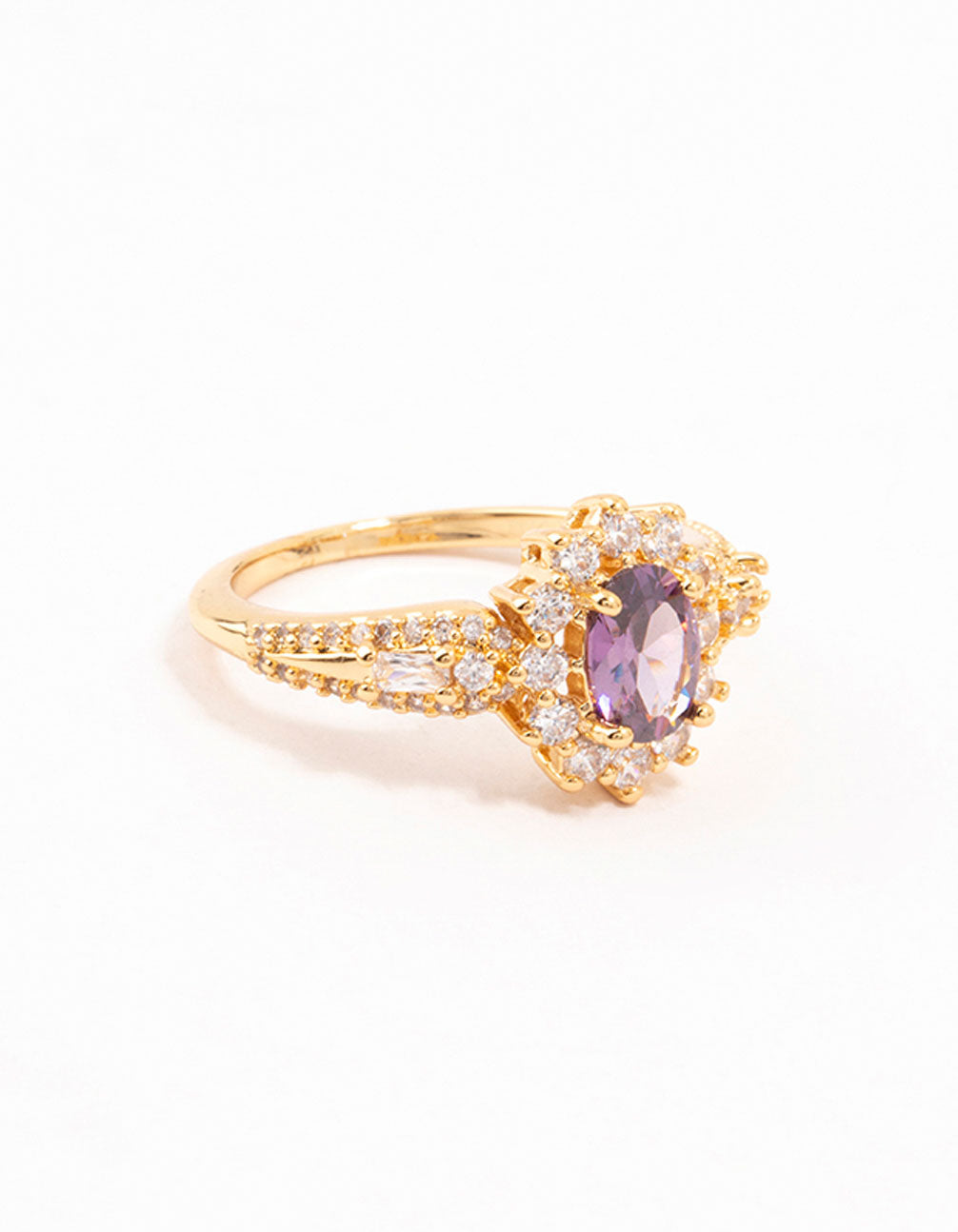 Crafted from gold opulent purple cubic zirconia statement ring featuring halo cut crystal in clear close up view