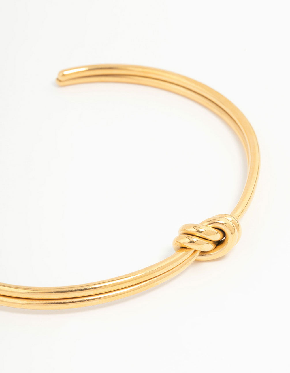Elegant waterproof gold plated stainless steel knotted wrist cuff close up view