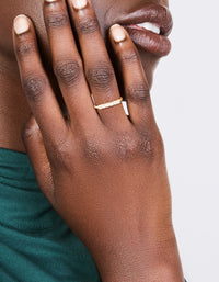 Elegant gold plated sterling silver ring with cubic zirconia in dainty style on finger view - link has visual effect only