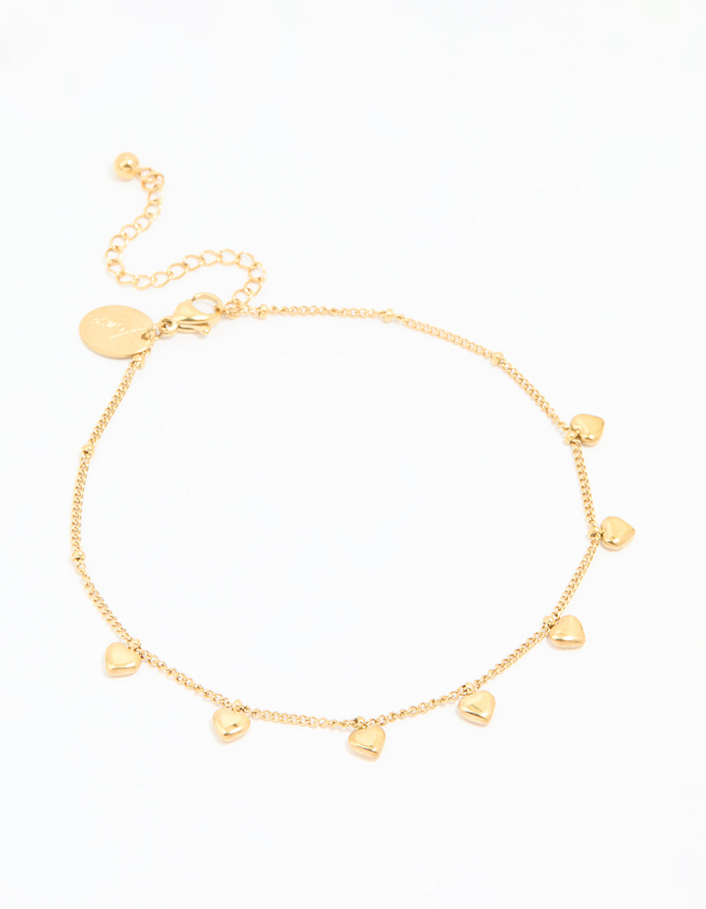Crafted from waterproof gold plated stainless steel, this dainty anklet features heart charms with ball accents in gold front view