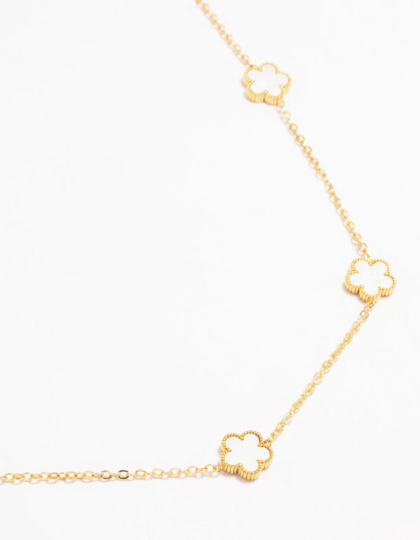 Showcasing a waterproof gold plated stainless steel shell petal flower pendant necklace featuring floral in dainty style close up view