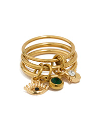 Introducing a waterproof gold plated stainless steel charm stacked ring with evil-eye details close up view - link has visual effect only