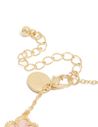 Designed with gold plated material, this pink flowers charm bracelet showcases and dainty style closure detail view - link has visual effect only