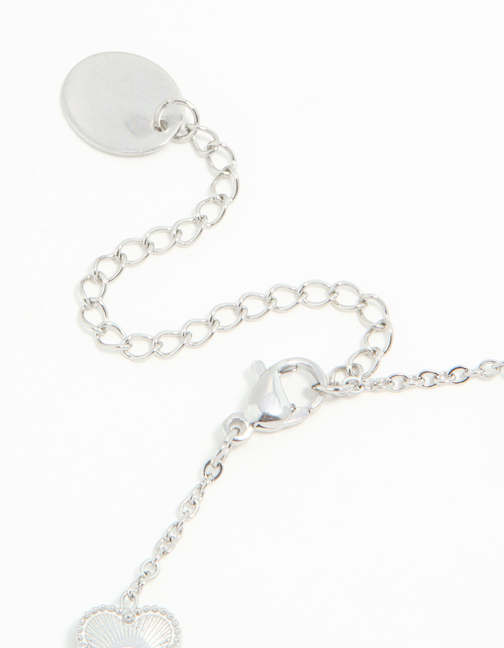 Designed with waterproof stainless steel flower petal charm bracelet in silver closure detail view