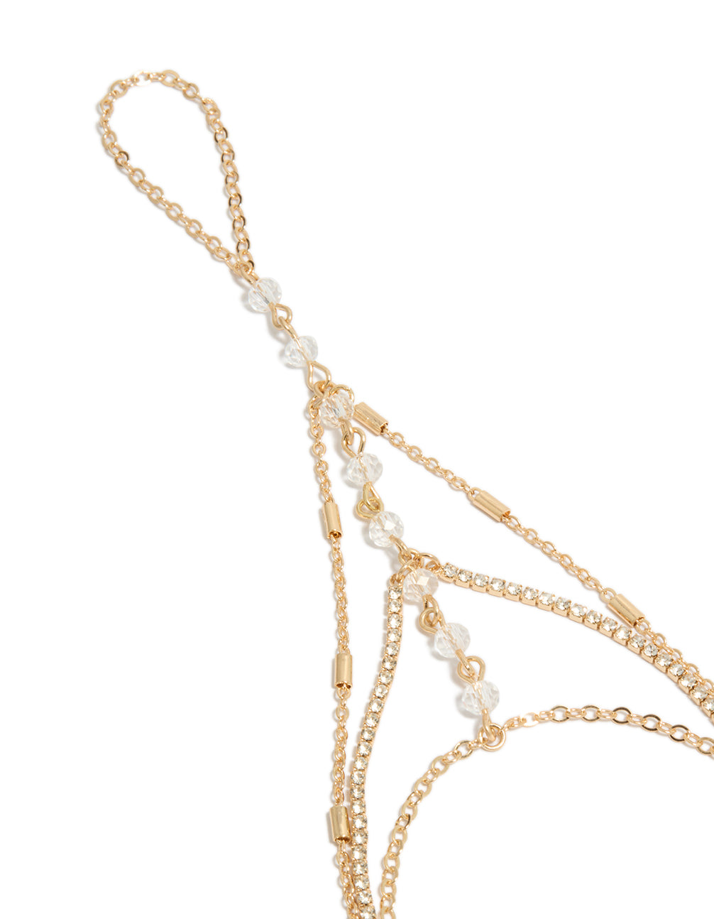 Featuring a gold layered hand chain with clear beads, diamante embellishments close up view