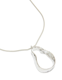 Showcasing a silver metal chain pendant necklace with statement styling close up view - link has visual effect only