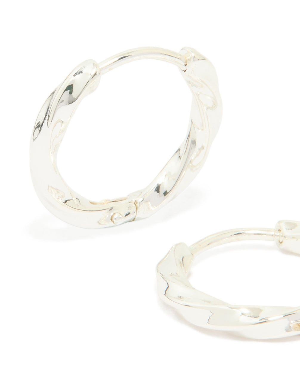 Detailed waterproof stainless steel twisted hoop earrings in silver close up view