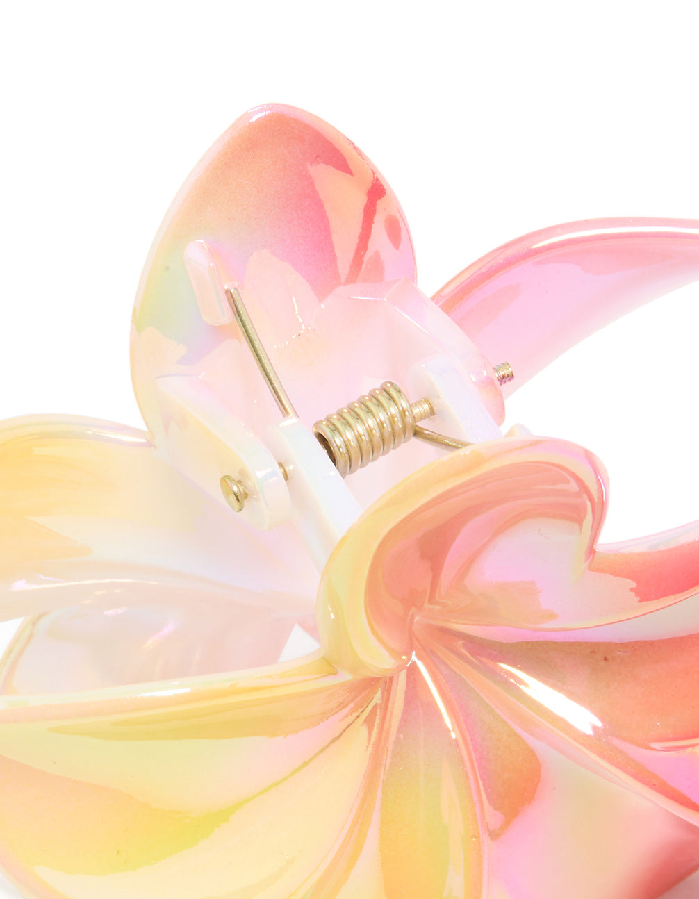 Crafted with an iridescent pink frangipani flower claw clip in light yellow, peachpuff, and lavender blush tones detail view