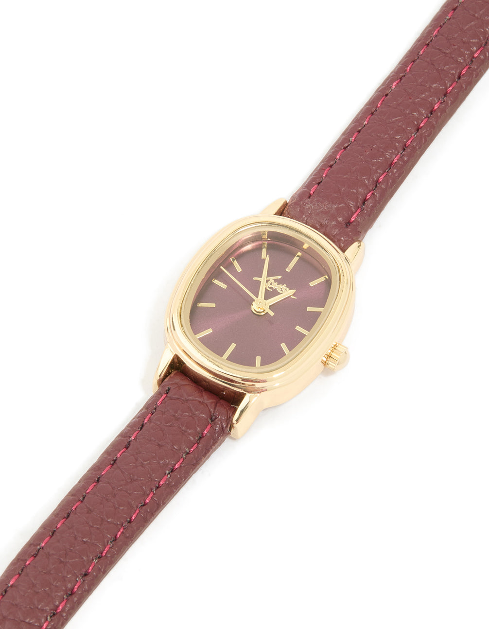 Featuring a brown dial and a leather strap designed for women, this gold burgundy PU leather oval watch with analog display is perfect for formal occasions watch face detail view