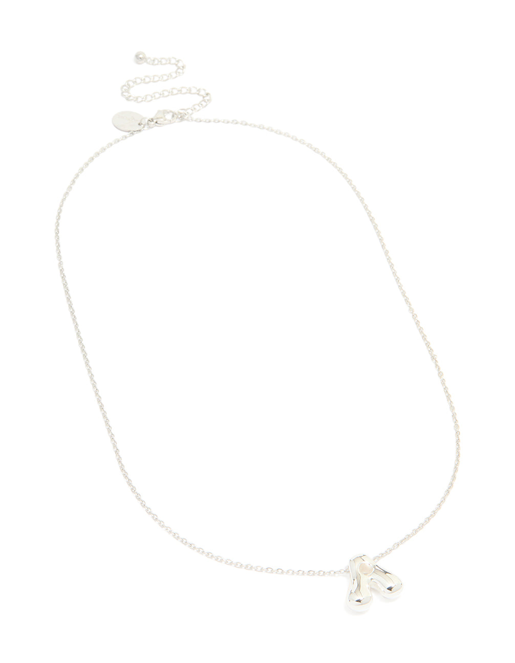 Showcasing an initial pendant necklace crafted from waterproof stainless steel in silver with dainty styling close up view