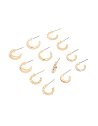 Showcasing dainty hoop earrings in a 6-pack set in gold finish front view - link has visual effect only